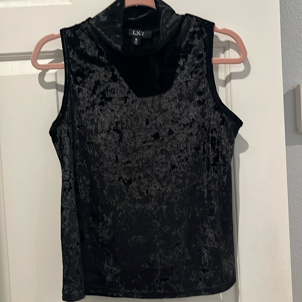 Black size medium L.N.V great under blazer or by itself